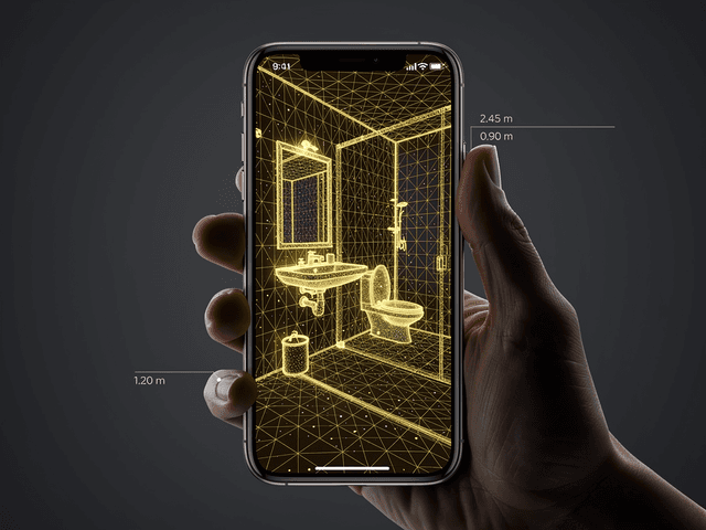 iPhone screen showing a glowing amber LiDAR wireframe mesh of a bathroom